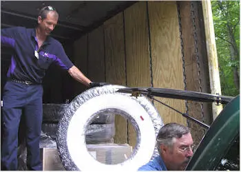 New tires for the Futurliner being delivered by a delivery man
