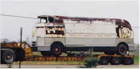 Rusted Futurliner close up on semi truck bed